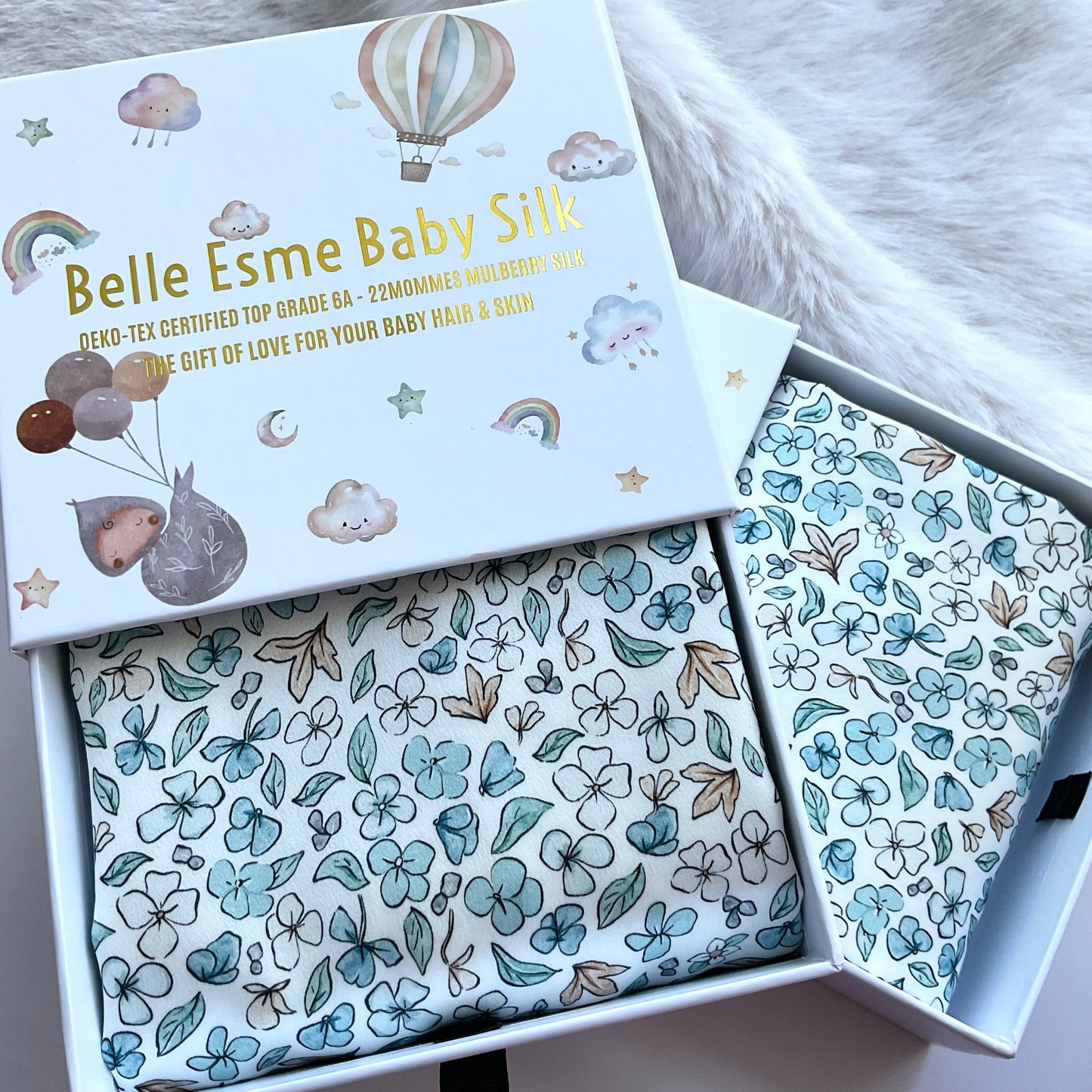 Ditsy Winter Blue Mulberry Silk Baby Cot Sleeve, cot slip (close up shot) for Baby bald spots and Eczema relief