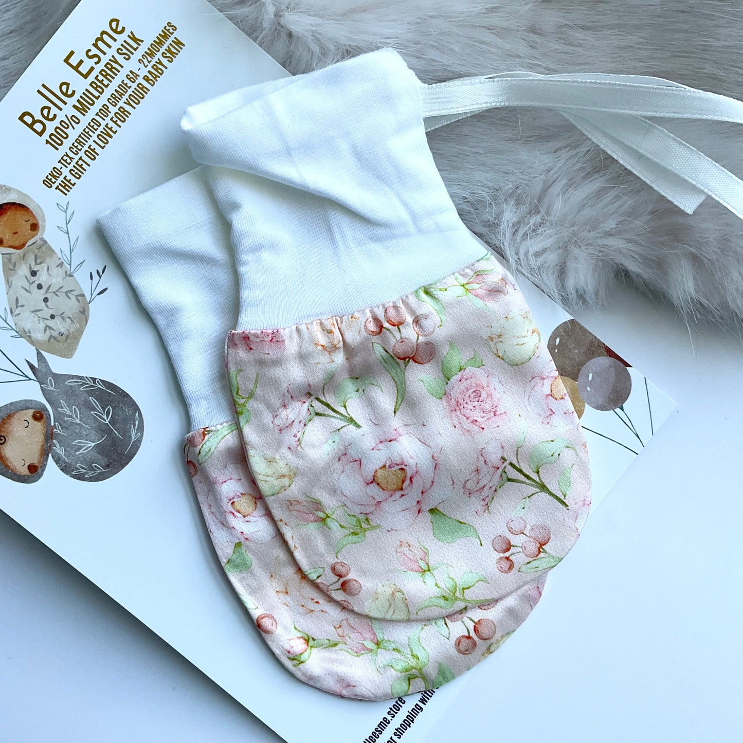 Mulberry silk baby mittens for eczema relief close up shot with charming rose pattern