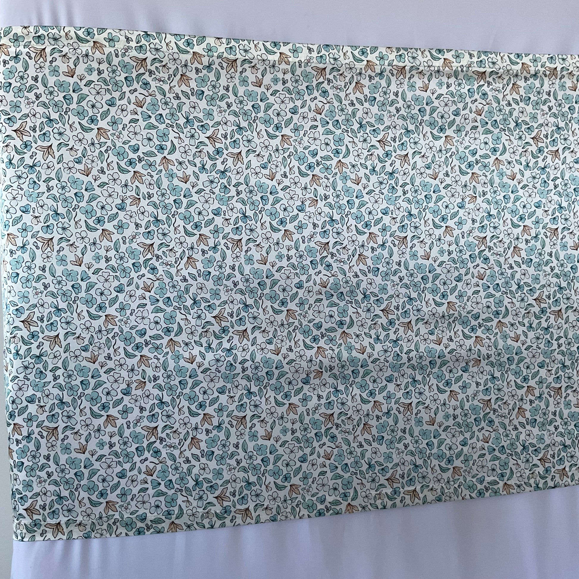 Ditsy Winter Blue Mulberry Silk Baby Cot Sleeve, cot slip (left angle shot) for Baby bald spots and Eczema relief 