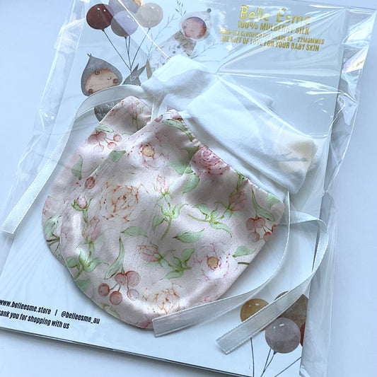 Mulberry silk baby mittens for eczema relief in packing with charming rose pattern
